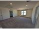 Large spare bedroom with ample natural light and walk in closet for storage at 143 Steppe Way, Garner, NC 27529