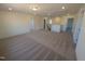 Spacious bonus room with neutral carpet and multiple doorways leading to other rooms in the house at 143 Steppe Way, Garner, NC 27529
