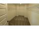 Spacious walk-in closet with carpeted floor and metal shelving for optimal storage at 143 Steppe Way, Garner, NC 27529