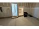 Garage offers interior access to the home with plenty of unfinished space for extra storage or workspace at 143 Steppe Way, Garner, NC 27529