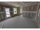 Bright and airy living room with access to exterior at 143 Steppe Way, Garner, NC 27529