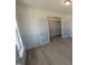 Stylish living room showcasing hardwood floors and classic wainscoting detail at 143 Steppe Way, Garner, NC 27529