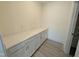 Large pantry area featuring ample counter space, cabinet storage, and convenient access to shelving at 143 Steppe Way, Garner, NC 27529