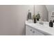 Clean bathroom with white vanity and single sink at 152 Brentfield Loop, Morrisville, NC 27560