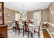 Bright dining room featuring a table set for six at 1699 Yorkshire Ln, Rocky Mount, NC 27803