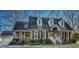Charming brick home with a landscaped yard and attached garage at 1699 Yorkshire Ln, Rocky Mount, NC 27803