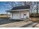 Detached garage with single car door and covered porch at 1699 Yorkshire Ln, Rocky Mount, NC 27803