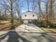 Single car garage with a basketball hoop at 2011 Watkins St, Raleigh, NC 27604