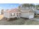 House exterior with American flag and landscaping at 202 Meadow Loop Dr, Clayton, NC 27527