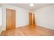 Spacious bedroom with hardwood floors and double doors at 2100 Tadley Dr, Chapel Hill, NC 27514