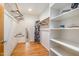 Large walk-in closet with ample shelving and hanging space at 2100 Tadley Dr, Chapel Hill, NC 27514