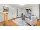Light and airy entryway with hardwood floors and seating area at 2100 Tadley Dr, Chapel Hill, NC 27514