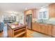 Modern kitchen with wood cabinets, stainless steel appliances and granite countertops at 2100 Tadley Dr, Chapel Hill, NC 27514