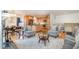 Open living room features hardwood floors, a cozy sitting area, and access to the kitchen at 2100 Tadley Dr, Chapel Hill, NC 27514
