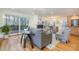 Bright living room with hardwood floors, fireplace, and sliding glass doors to deck at 2100 Tadley Dr, Chapel Hill, NC 27514