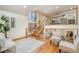 Modern glass and wood staircase leading to an upper level at 2100 Tadley Dr, Chapel Hill, NC 27514