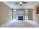 Gathering room featuring a fireplace and large windows at 212 Red Field St, Cary, NC 27513