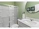 Simple bathroom with a shower, toilet, and white vanity at 233 John Stark Dr, Fuquay Varina, NC 27526