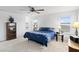 Bright bedroom with a double bed, carpet flooring, and plenty of natural light at 233 John Stark Dr, Fuquay Varina, NC 27526