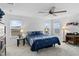 Spacious bedroom with a comfortable bed and plenty of natural light at 233 John Stark Dr, Fuquay Varina, NC 27526