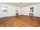 Bright living room featuring hardwood floors and classic details at 313 S Main Street St, Wake Forest, NC 27587