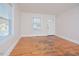 Simple living room with hardwood floors and neutral walls at 331 Clark St, Durham, NC 27701