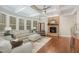 Living room with stone fireplace and coffered ceiling at 332 Karpen Ln, Cary, NC 27519