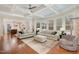 Spacious living room with hardwood floors and a view of the kitchen at 332 Karpen Ln, Cary, NC 27519