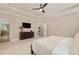 Spacious main bedroom with attached bathroom and dresser at 332 Karpen Ln, Cary, NC 27519