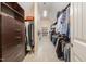 Large walk-in closet with ample shelving and hanging space at 332 Karpen Ln, Cary, NC 27519