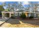 Charming ranch home with fresh exterior paint and carport at 3411 Octavia St, Raleigh, NC 27606