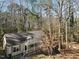 House nestled in woods with lake view at 356 Harbor Trace, Sanford, NC 27332