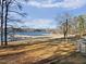 Lakefront property with sandy beach and clear water at 356 Harbor Trace, Sanford, NC 27332