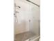 Clean shower with glass enclosure and tiled walls at 3726 Randolph Rd, Durham, NC 27705