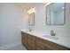 Elegant bathroom with double vanity, quartz countertops and gold fixtures at 4120 Emily Ln, Oxford, NC 27565