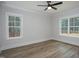 Spacious bedroom with hardwood floors and large windows at 4120 Emily Ln, Oxford, NC 27565