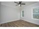 Spacious bedroom with two windows and wood-look flooring at 4120 Emily Ln, Oxford, NC 27565