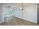 Bright dining room features hardwood floors and a chandelier at 4120 Emily Ln, Oxford, NC 27565