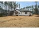 Charming house exterior with backyard at 4120 Emily Ln, Oxford, NC 27565