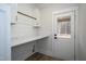 Laundry room with built-in counter and cabinets at 4120 Emily Ln, Oxford, NC 27565