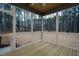 Relaxing screened porch overlooking wooded backyard at 4120 Emily Ln, Oxford, NC 27565