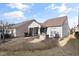 Exterior view of house with backyard patio and screened porch at 420 Farintosh Valley Lane Ln, Durham, NC 27703