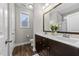 Modern bathroom with dual vanity sinks and a large mirror at 430 Heart Pine Dr, Wendell, NC 27591