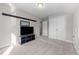 Well-lit bedroom with double doors and wall-mounted shelving at 430 Heart Pine Dr, Wendell, NC 27591