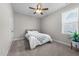 Cozy bedroom with double bed, carpet flooring, and ceiling fan at 430 Heart Pine Dr, Wendell, NC 27591
