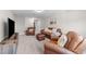 Bonus room featuring comfortable leather seating and a large TV at 430 Heart Pine Dr, Wendell, NC 27591