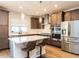 Contemporary kitchen featuring stainless steel appliances and an island at 45 Oatland Pl, Pittsboro, NC 27312