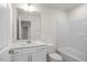 Clean bathroom, featuring a white vanity, bathtub, and mirror at 5016 Tura St, Raleigh, NC 27610