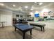 Community rec room with ping pong, pool table, and arcade games at 5016 Tura St, Raleigh, NC 27610