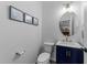 Powder room with a pedestal sink and stylish vanity at 5220 Trilogy Farm Dr, Raleigh, NC 27603